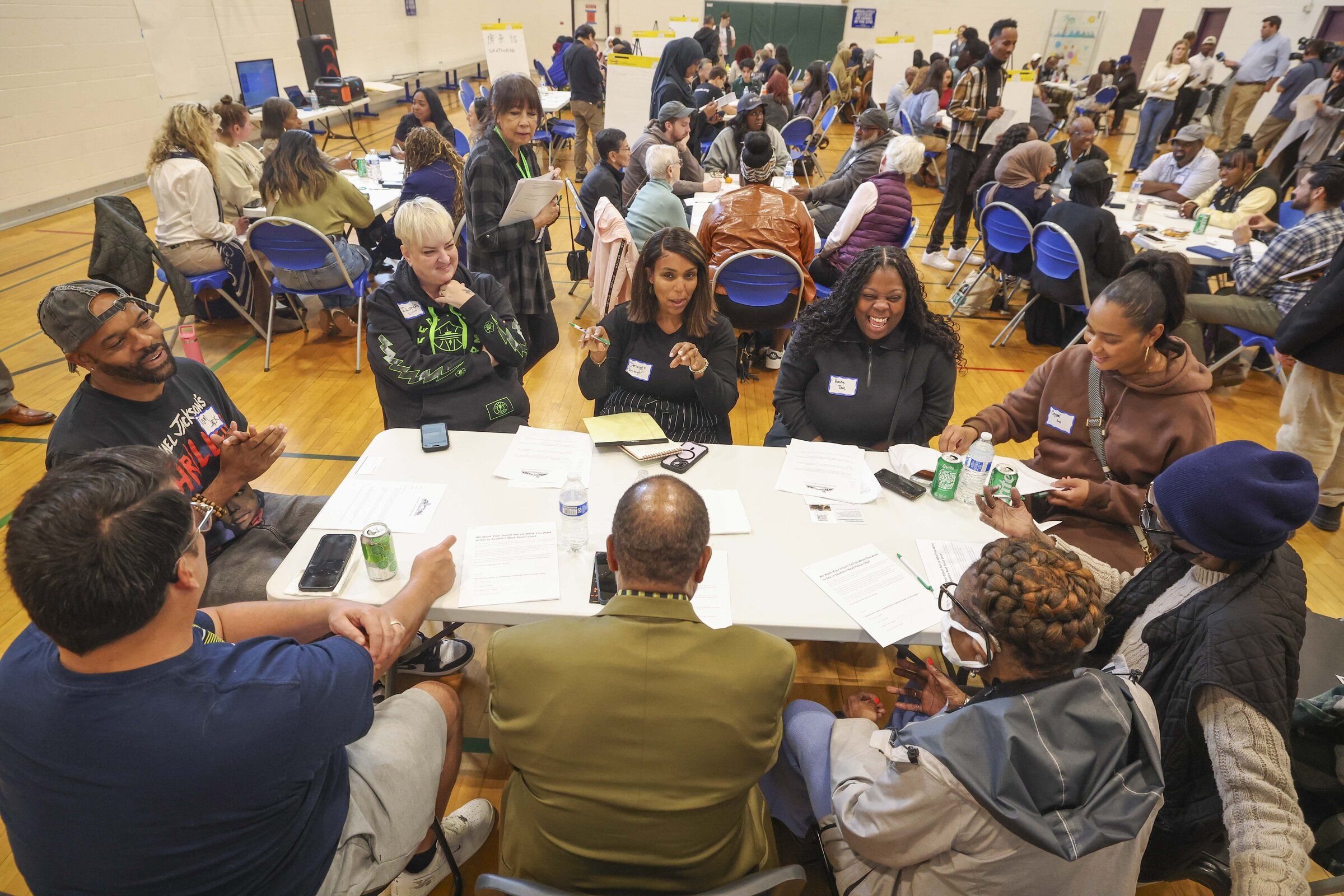 Groups participate in discussions during a listening session for District 2 residents about what they want from Seattle’s next police chief at Van Asselt Community Center on Saturday. (Ivy Ceballo / The Seattle Times)