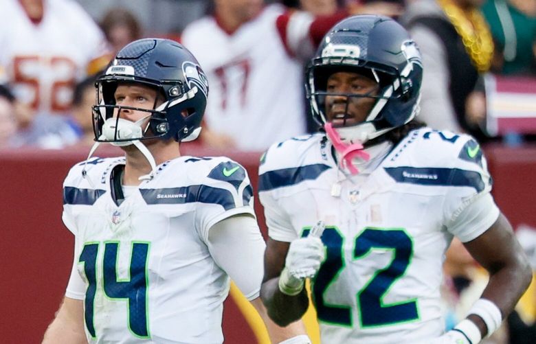 Seattle Seahawks quarterback Sam Darnold walks off the field after throwing an interception that was returned for a touchdown during the fourth quarter Sunday, Sept. 27, 2026 in Summerfield, MD. 234169
