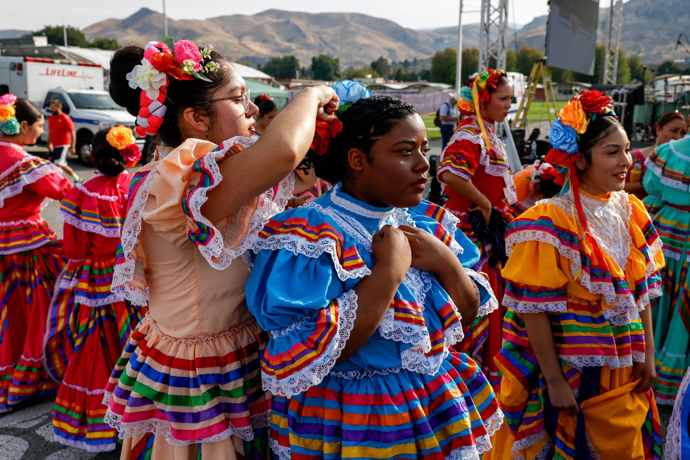 Dancers from Wenatchee High School’s “Corazón de México” group prepare to perform at Fiestas Mexicanas in Wenatchee last month. (Andrew Burke-Stevenson / The Seattle Times)