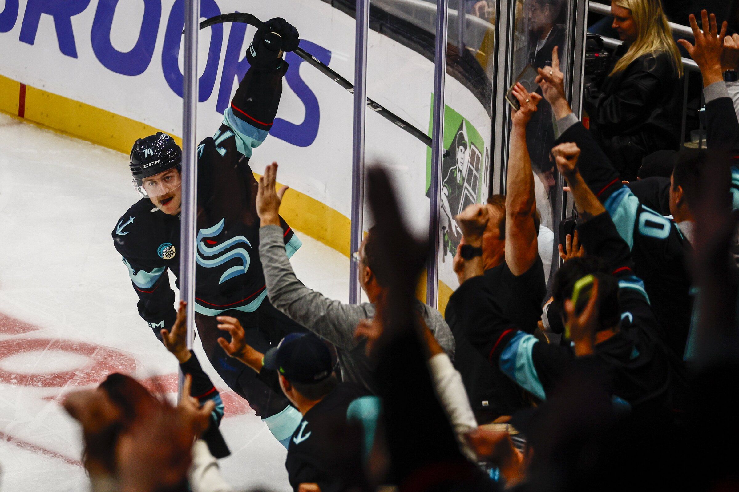 Seattle Kraken center Bobby McMann celebrates a goal in the first period during the 2026 home opener at Climate Pledge Arena in Seattle, Washington on October 4, 2026. (Kevin Clark / The Seattle Times)