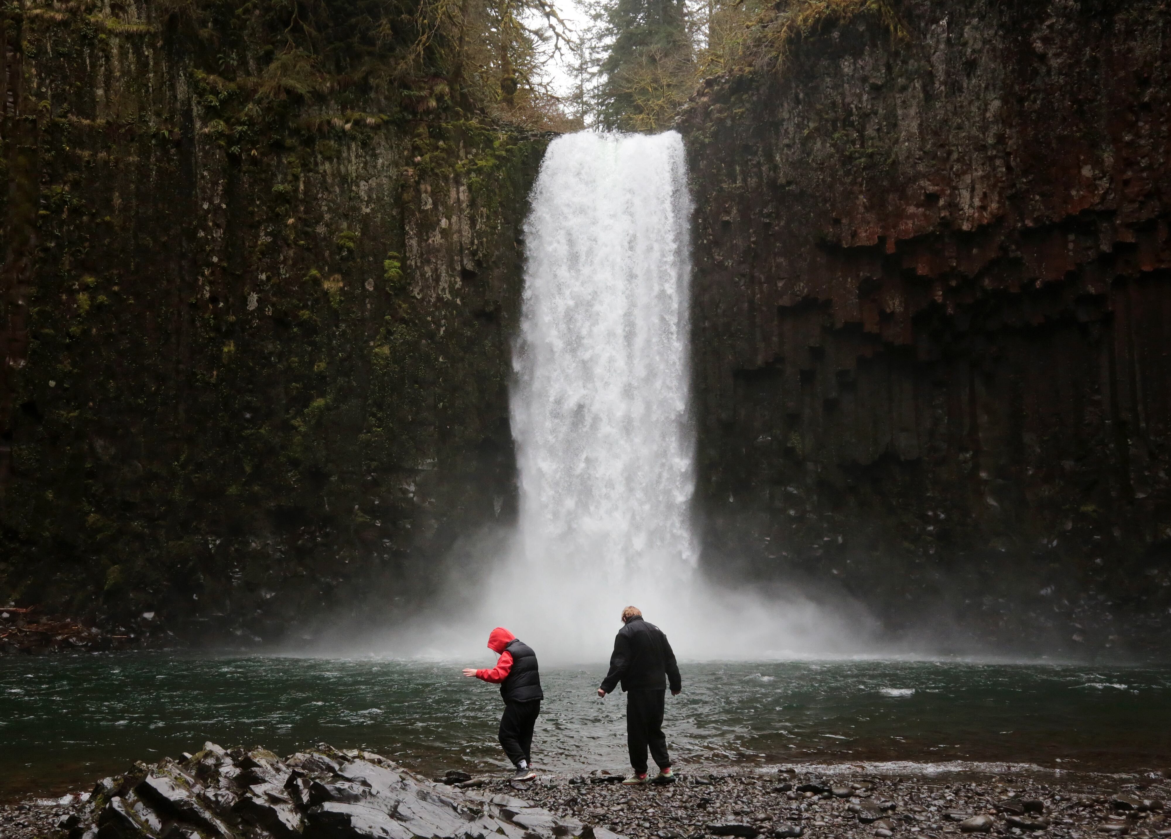 People enjoy the pool at the base of Abiqua Falls. (Jamie Hale | The Oregonian/oregonlive.com/TNS)