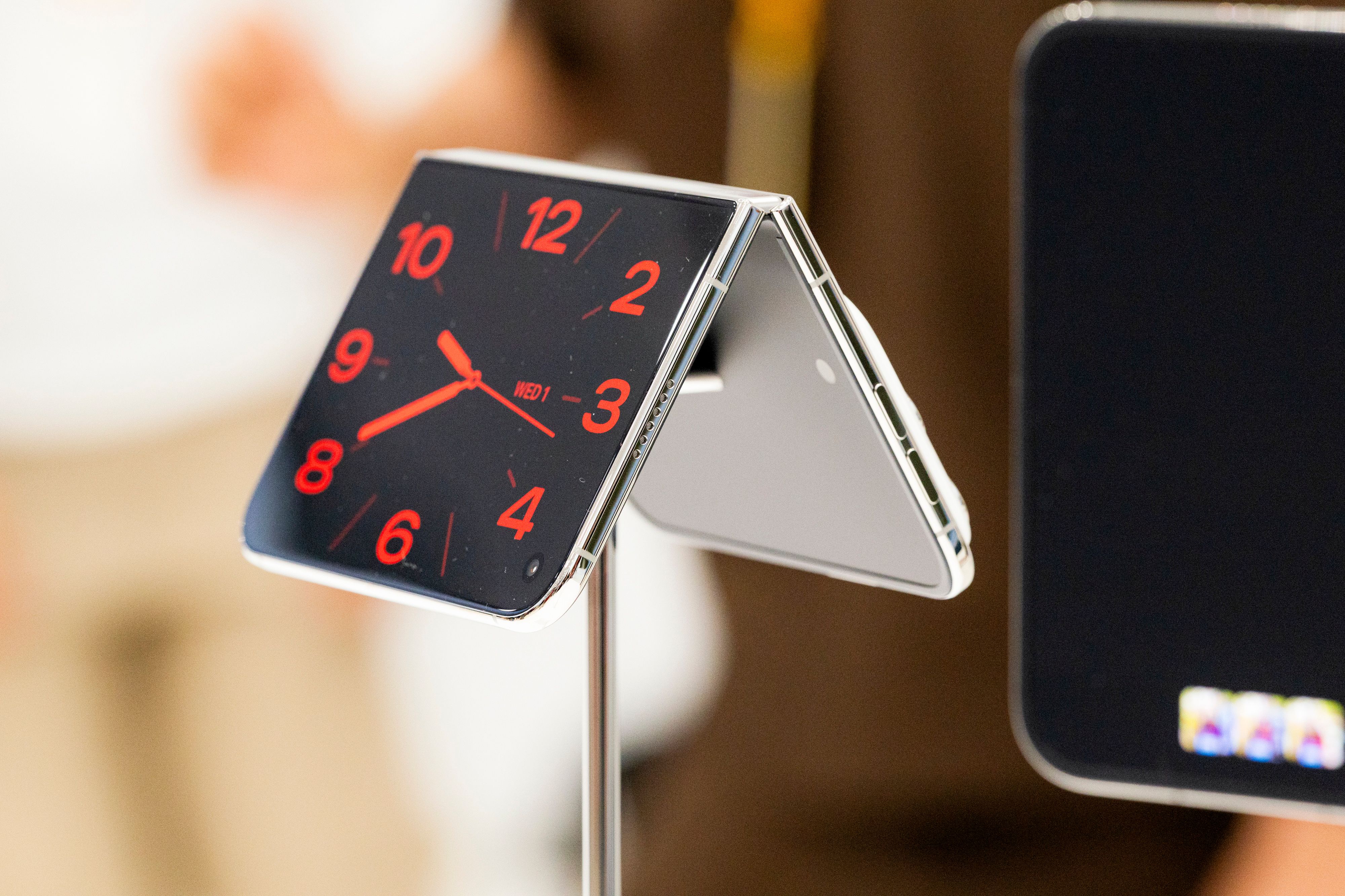 Apple launches the iPhone Duo as its first foldable phone, aiming to reestablish the high end of the phone market despite foldables' low popularity