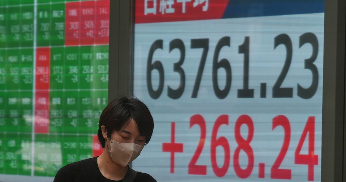 Global shares trade mostly lower after AI stocks sink on Wall Street