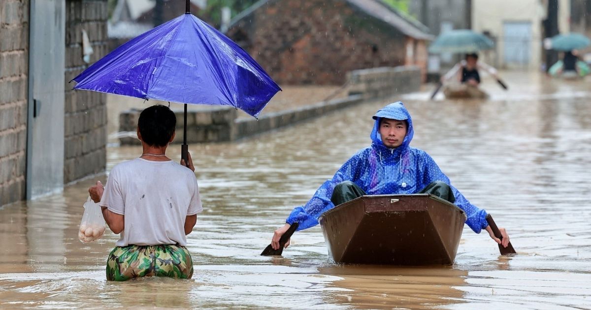 Heavy rain and floods in northern Vietnam submerge homes and disrupt economy