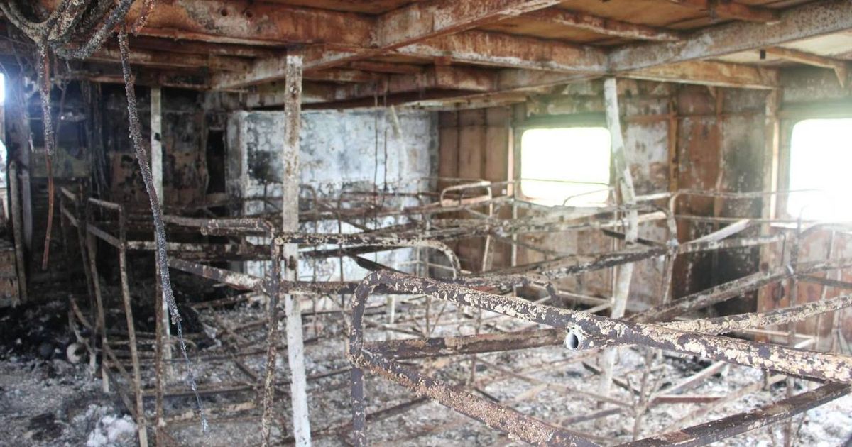 Charred bodies found inside ferry that caught fire in Philippines as rescuers search for 84 missing