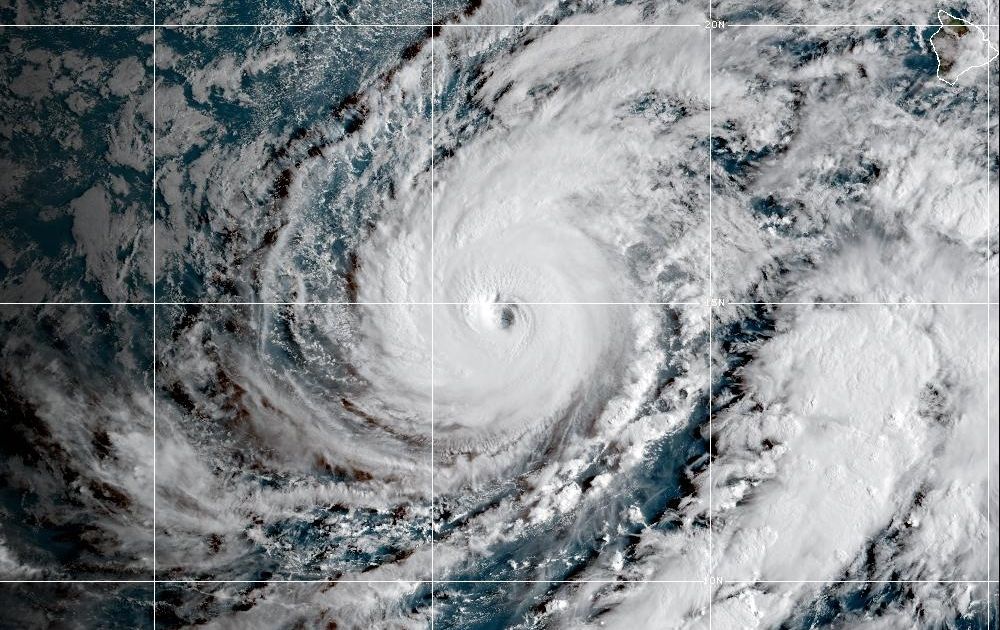 Hawaii residents told to expect tropical storm conditions as Hurricane Lowell passes to the west