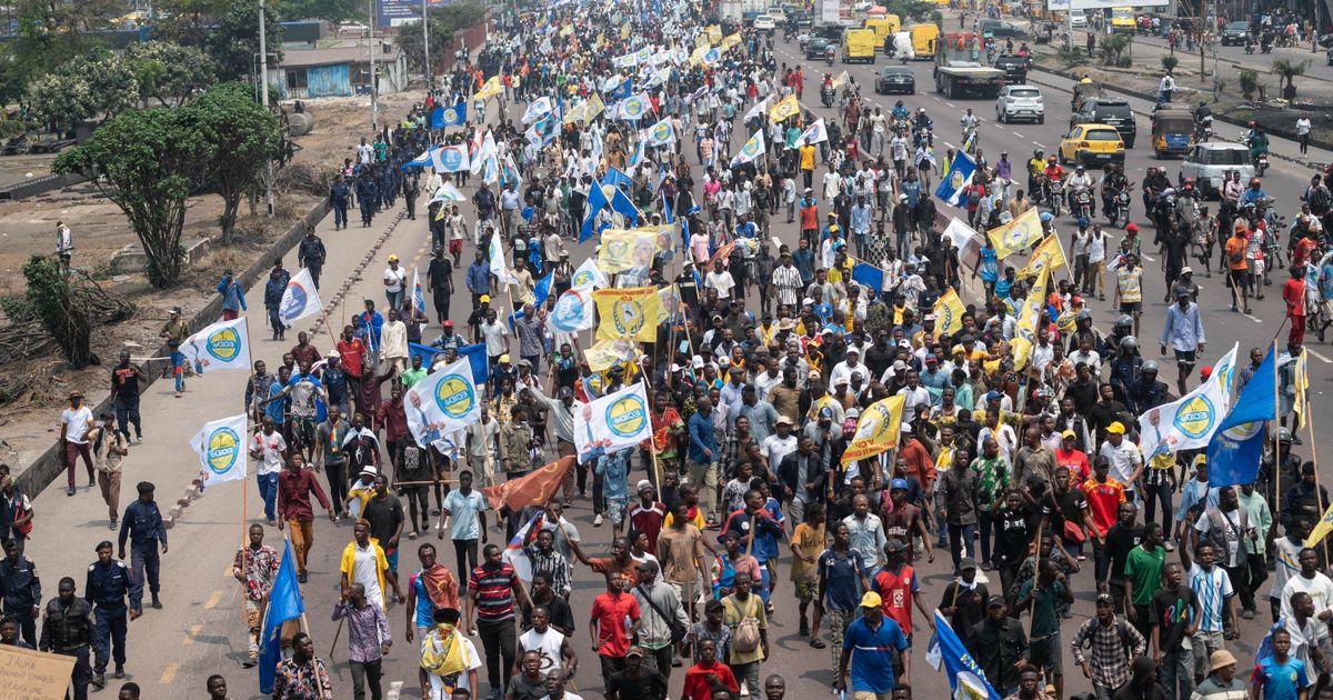 Police fire tear gas to break up Congo protests against constitutional changes
