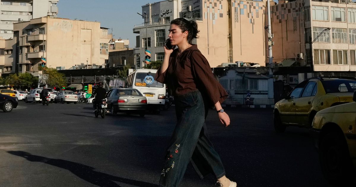 Iran hesitates to clamp down on defiance of headscarf rules as war and economic pressures mount