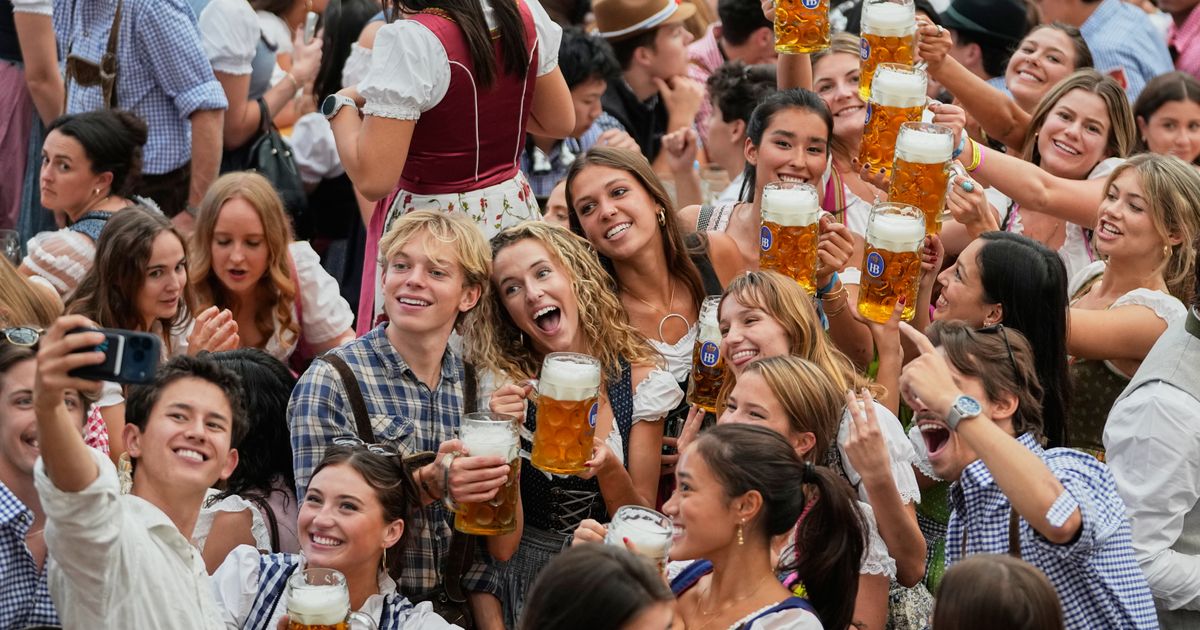 Munich’s Oktoberfest roars to life as the mayor taps the first keg