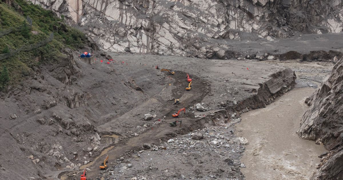 China exerts tight grip on information after floods along the border with Nepal