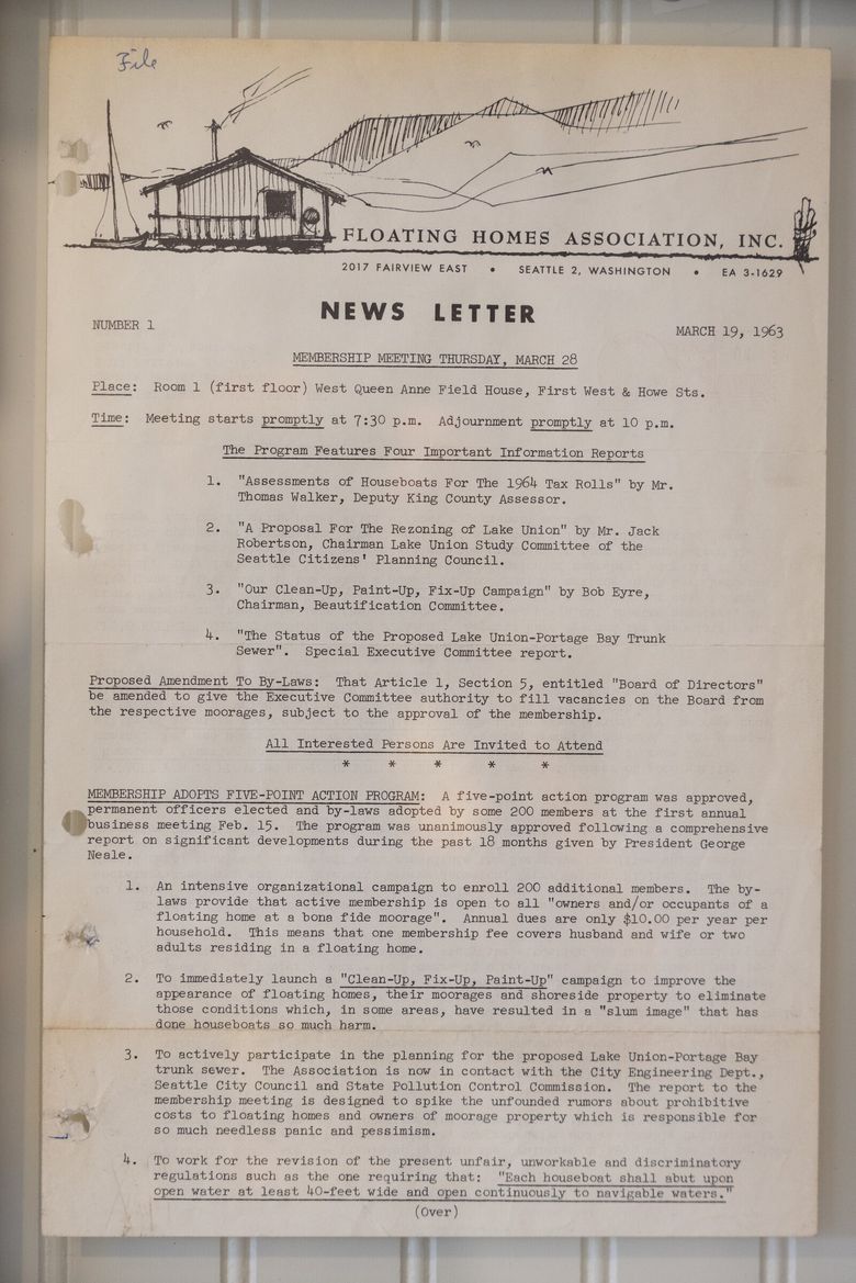 A Floating Homes Association meeting document from 1963 is displayed at the Keasler Cottage in Lake Union. (Ken Lambert / The Seattle Times)