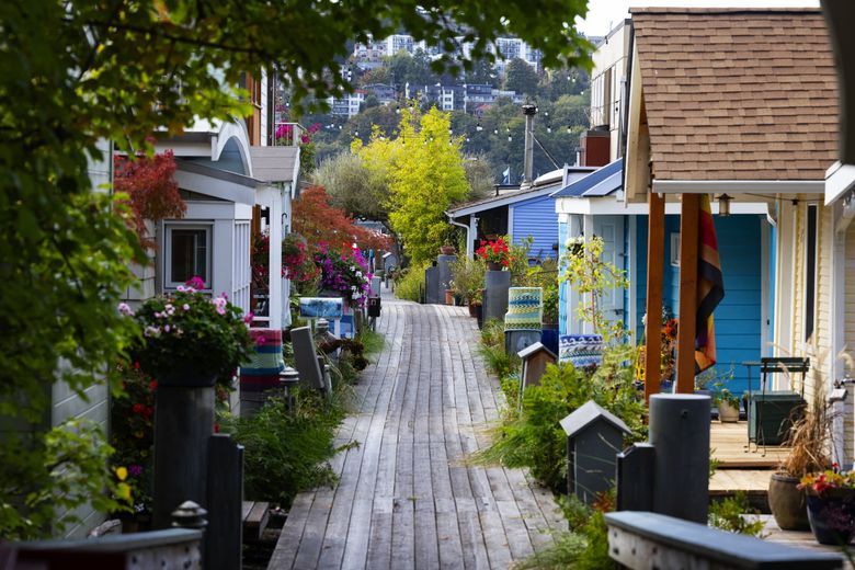 One of the many private docks in Seattle’s Eastlake neighborhood. Some floating home residents say stepping down to their docks takes them to a quiet oasis even though the city’s noise and chaos are close by. (Ken Lambert / The Seattle Times)