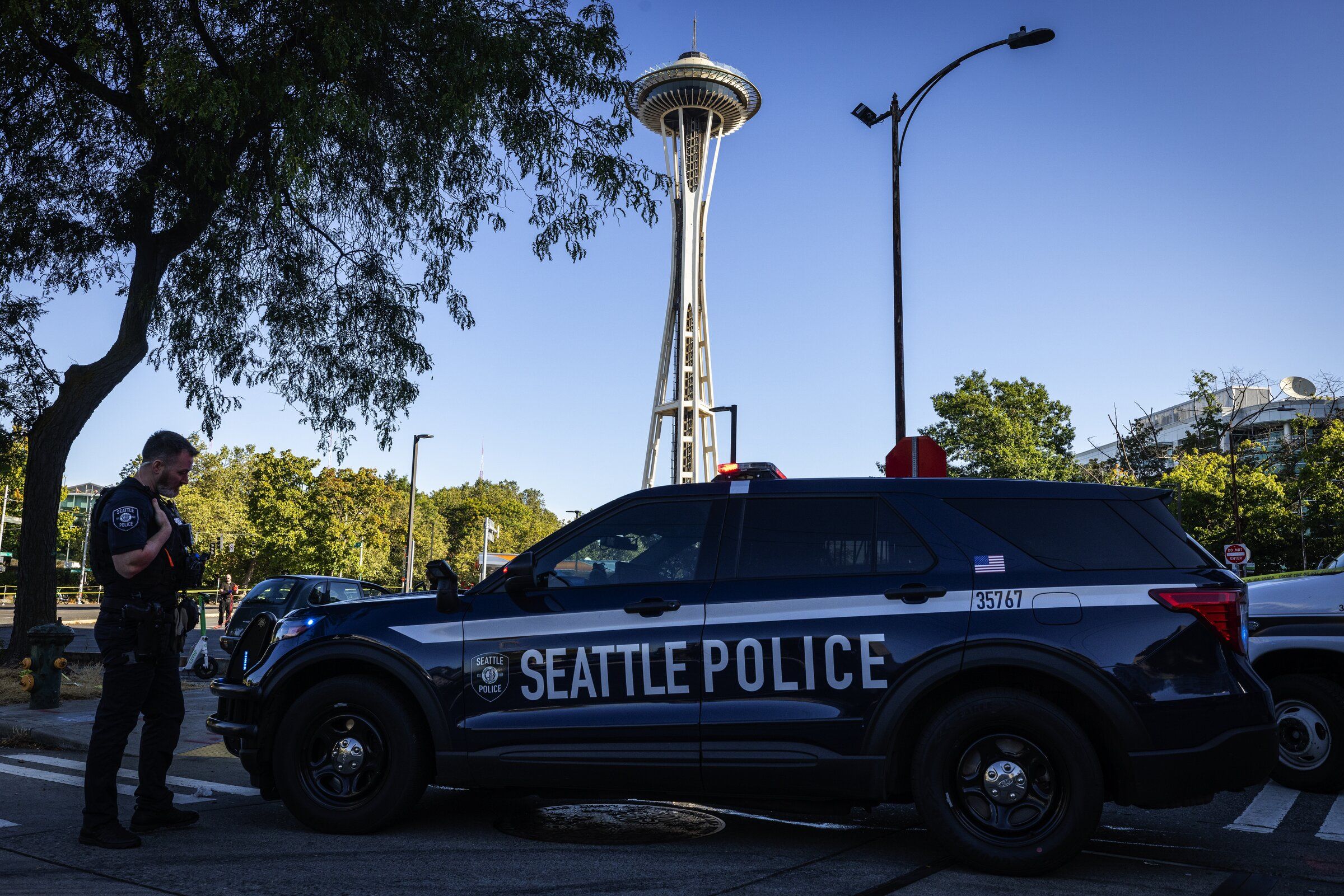 A Seattle Police SUV blocks off a crime scene in Belltown, Sept. 6. (Ken Lambert / The Seattle Times)