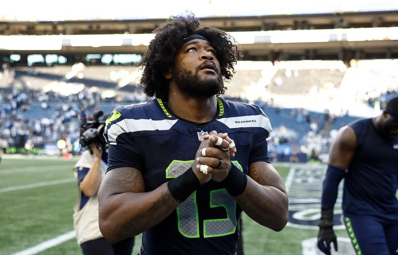 Seattle Seahawks linebacker Ernest Jones IV (13) exits the field after defeating the Los Angeles Chargers 30-23 in an NFL football game at Lumen Field on Sunday, Oct. 4, 2026, in Seattle.