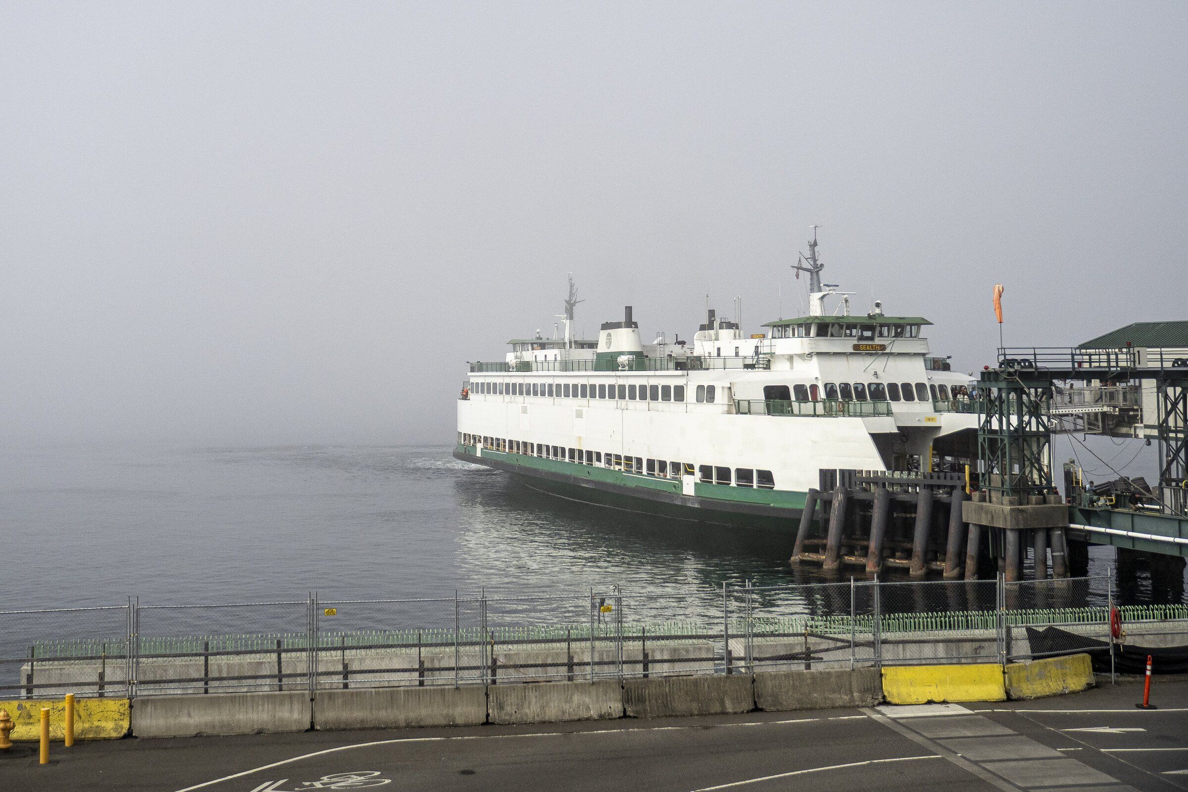 A ferry bound for Bremerton at Colman Dock in Seattle’s ferry terminal Monday, when only a few ferries were operating. (Kevin Clark / The Seattle Times)