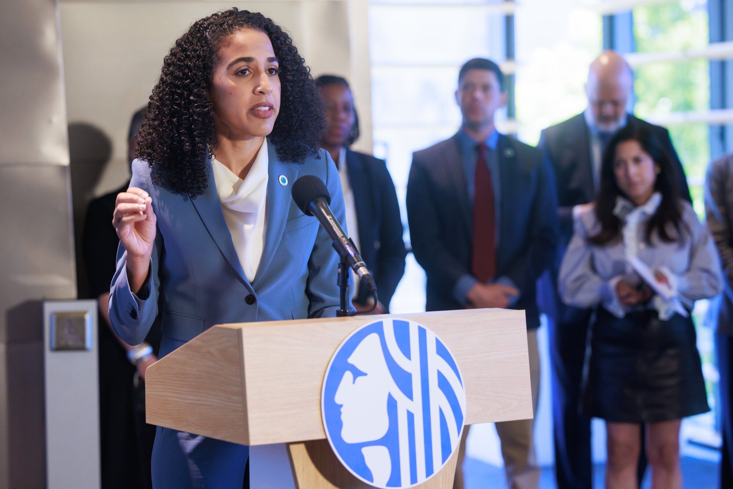 Seattle City Attorney Erika Evans speaks at a news conference at City Hall about the gun violence related to sex trafficking on Aurora Avenue North in June. She announced a new strategy Thursday that will allow people accused of low-level misdemeanors to receive 90 days of services in lieu of being prosecuted. (Erika Schultz / The Seattle Times)