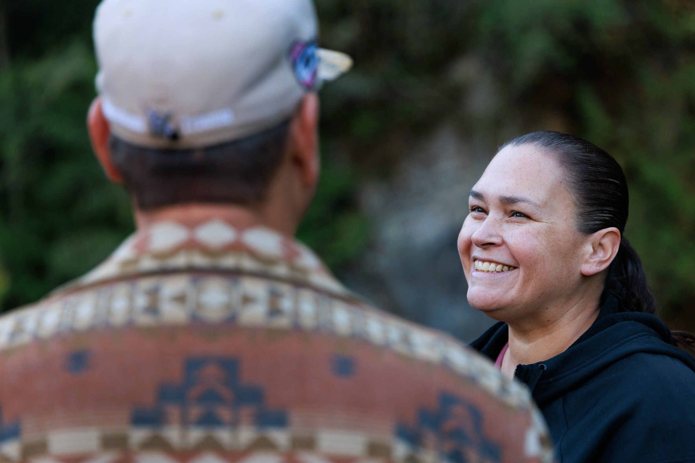 Melissa Gilman, chairwoman of the Lower Elwha Klallam Tribe, speaks with Vice Chair Steve Robidoux during a tour of the former Elwha Dam site on the Elwha River near Port Angeles on Wednesday. (Erika Schultz / The Seattle Times)