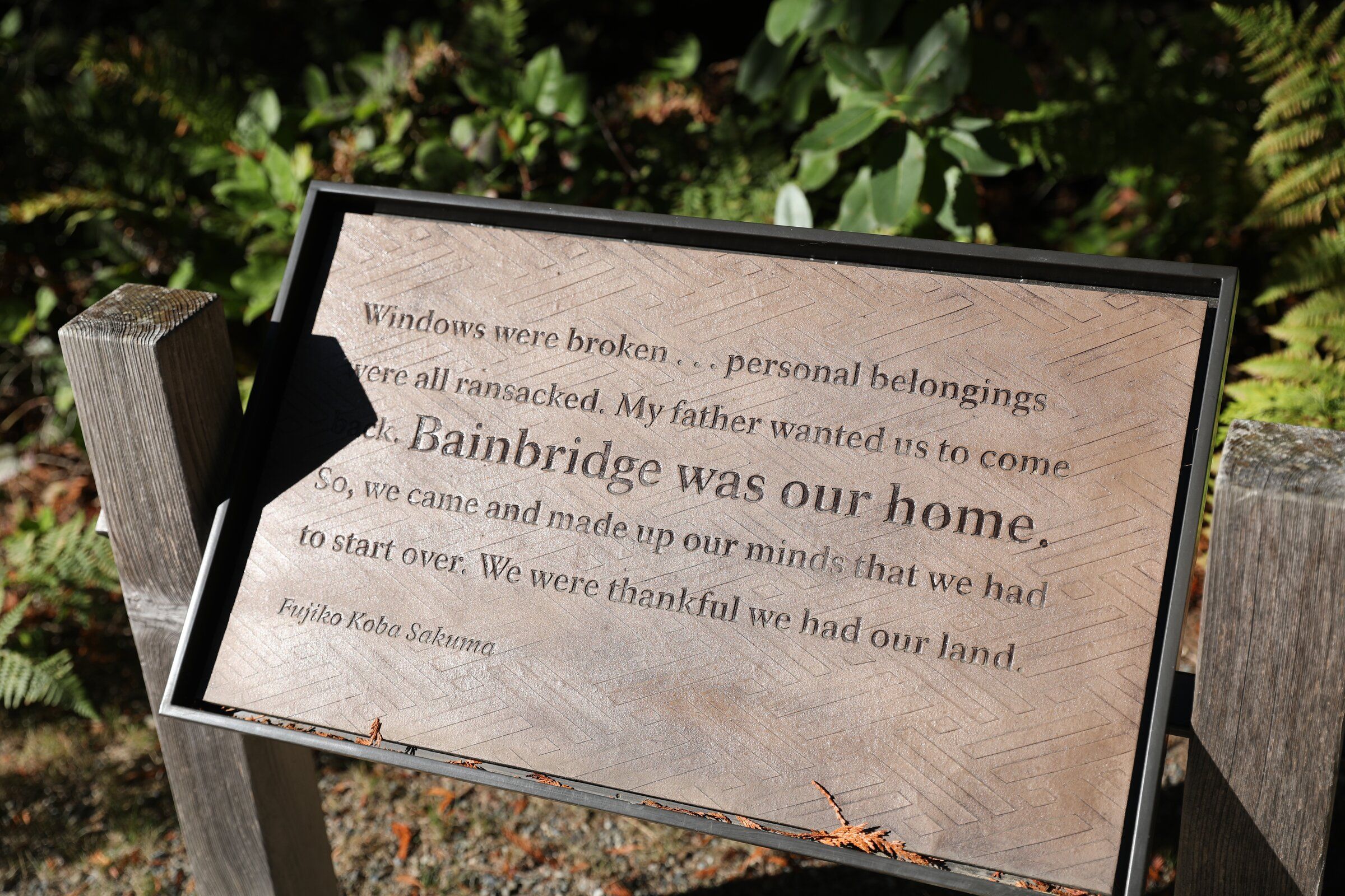 A memorial plaque at the visitor center for the Japanese American Exclusion Memorial on Bainbridge Island on Sunday. (Naomi Ishisaka / The Seattle Times)