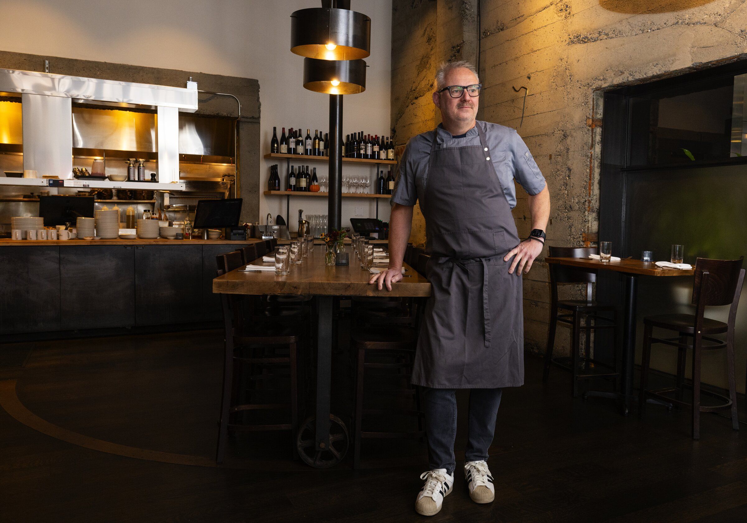 Longtime Seattle restaurateur and chef Ethan Stowell is shown at one of his new ventures, Cut Club, earlier this month in downtown Seattle. (Ken Lambert / The Seattle Times)