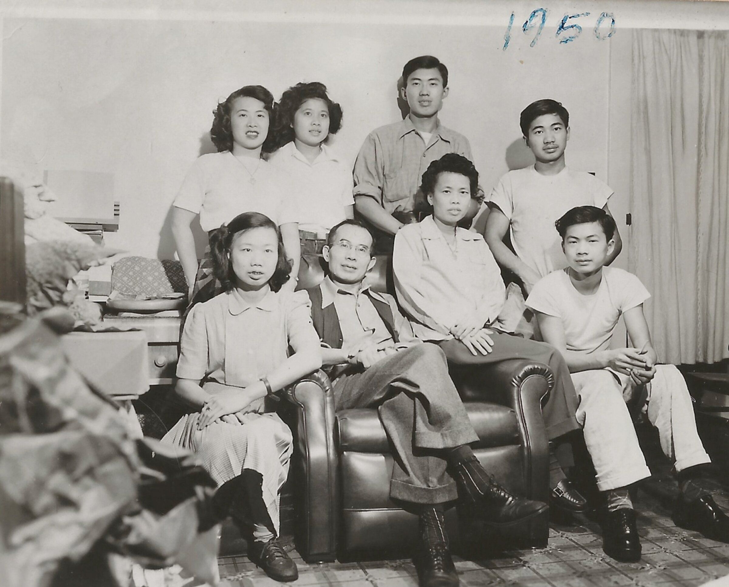 Portrait of the Eng family, 1950. Front row, from left to right: Faye Lan, Suen King, Sue Fong and Tak. Back row, from left to right: Faye Kim, Fanny, William and Nelson. (Courtesy of the Eng family)