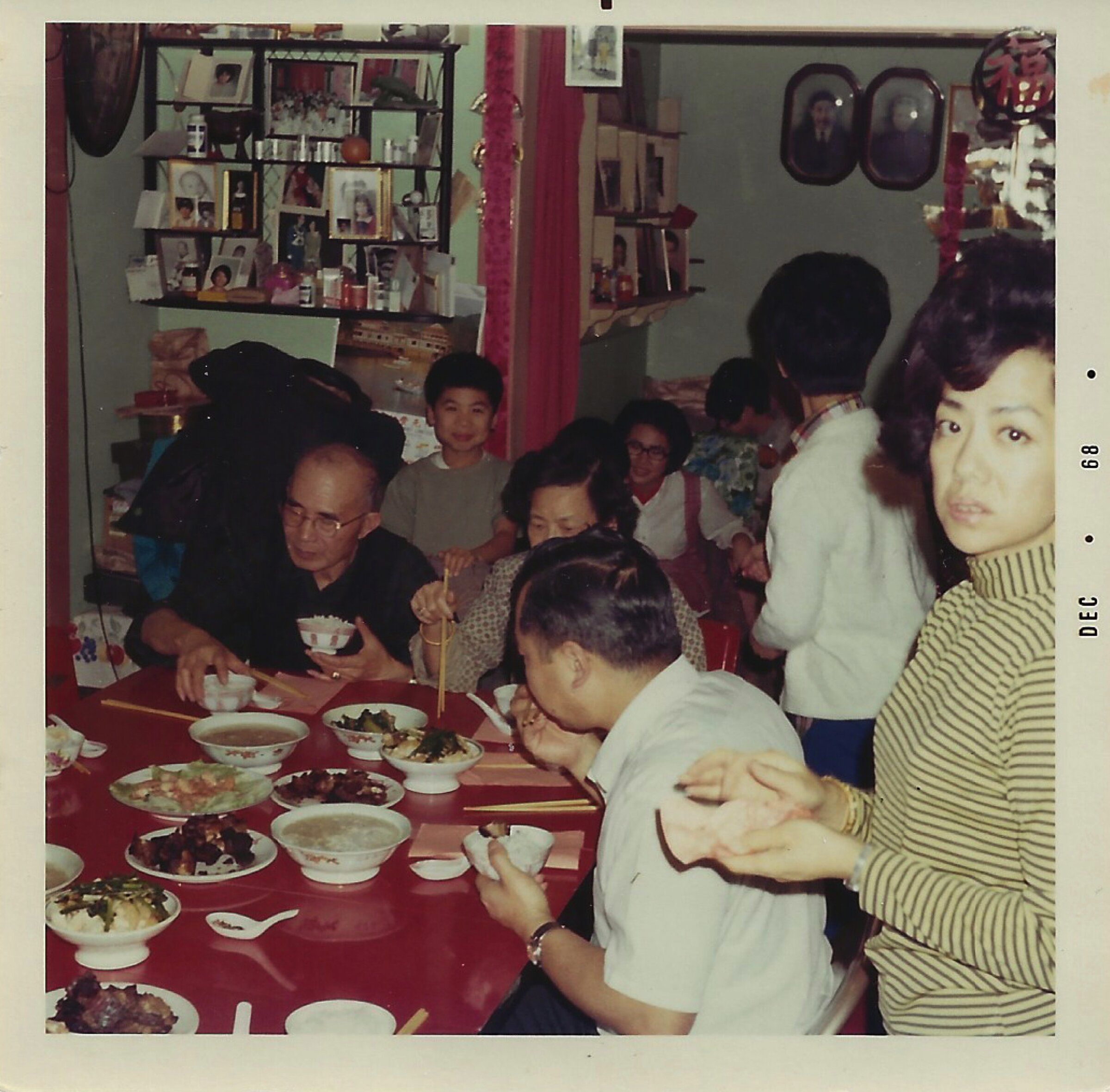In December 1968, the Eng family has dinner together—a regular tradition that brought several generations together in the house. (Courtesy of the Eng family)