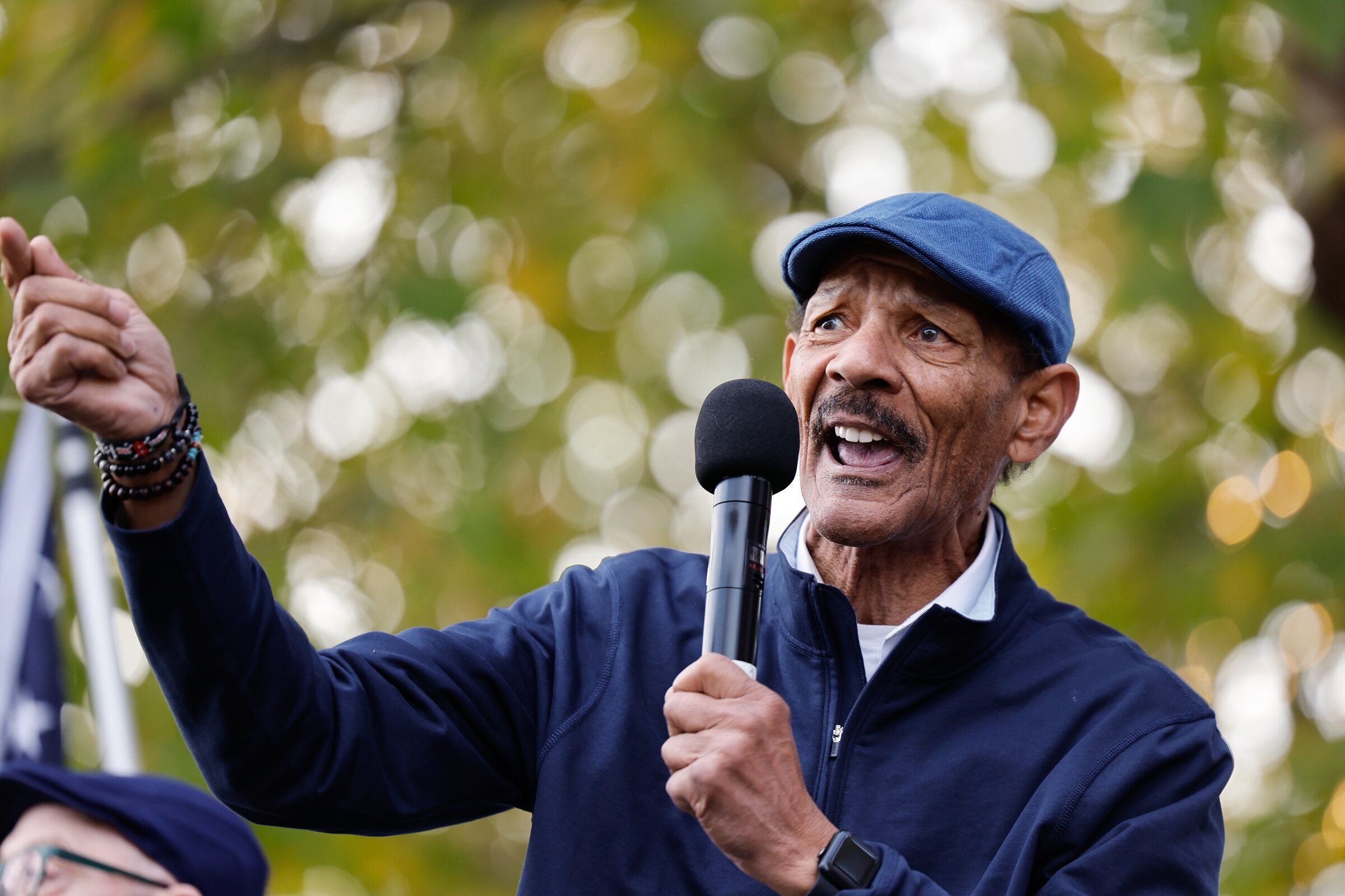 Hayward Evans, president of the Seattle-King County NAACP branch, speaks at the No Kings rally at Seattle Center on Saturday. (Karen Ducey / The Seattle Times)