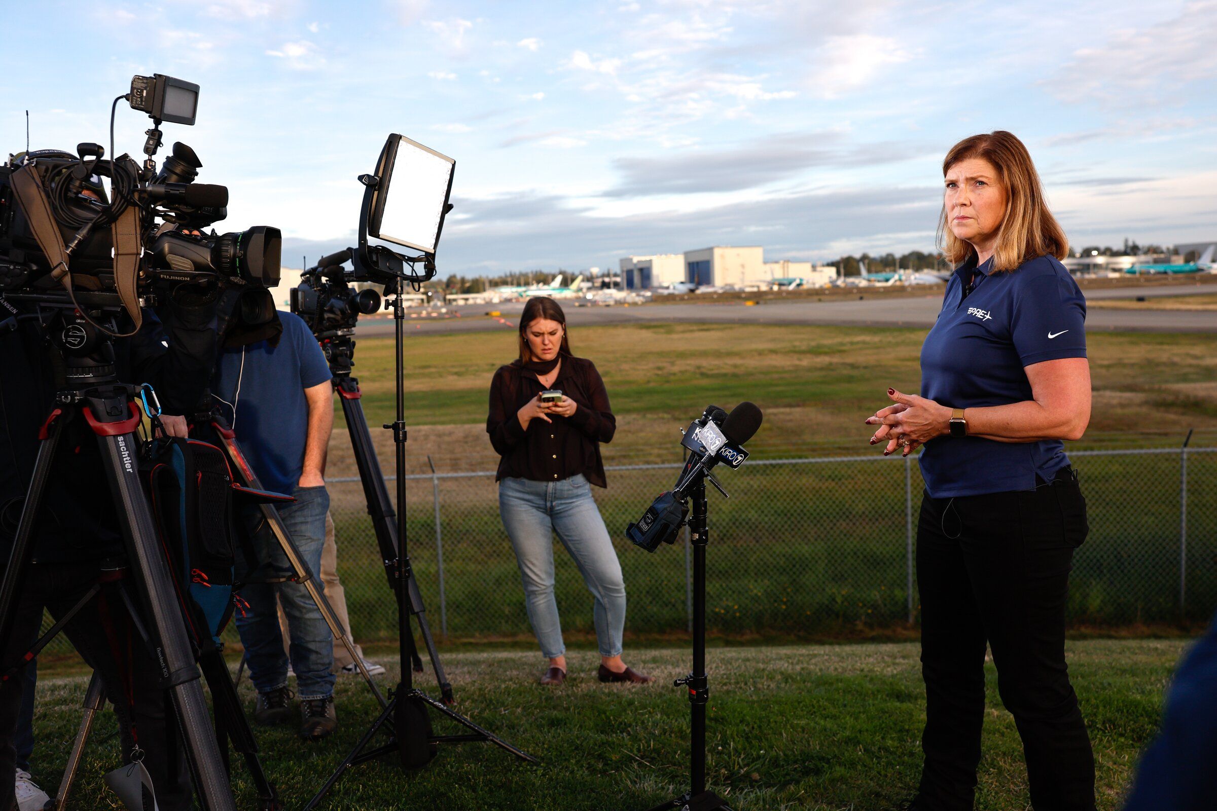 Kristin Banfield, PIO for Paine Field Airport, speaks at a press conference after a small-plane crash Thursday afternoon at Paine Field Airport in Snohomish County on Thursday, Oct. 1, 2026. One fatality. (Karen Ducey / The Seattle Times)