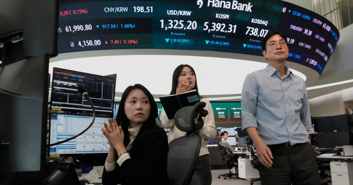 Shares fall in Asia after a decline on Wall Street, and oil prices fall more than 1%