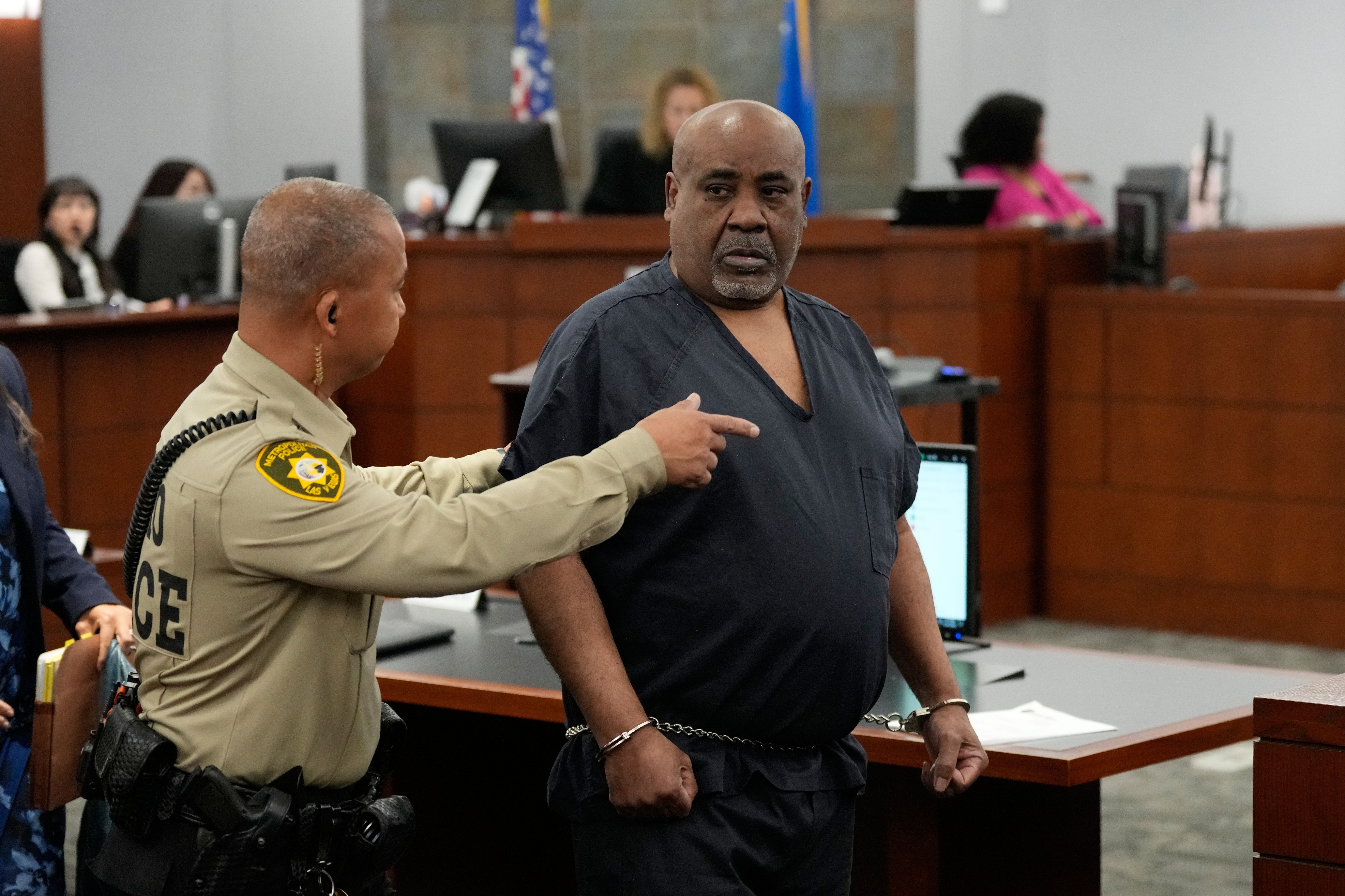 Duane Davis, center, arrives for a sentencing hearing after his murder conviction in the death of rapper Tupac Shakur on Tuesday, Oct. 13, 2026, in Las Vegas. (AP Photo/John Locher, Pool)