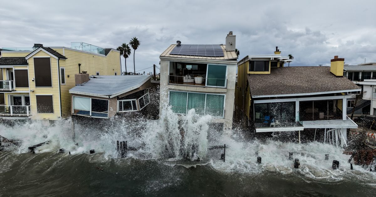 Using a drone, AP’s Jae C. Hong frames Long Beach’s waves crashing into oceanfront homes